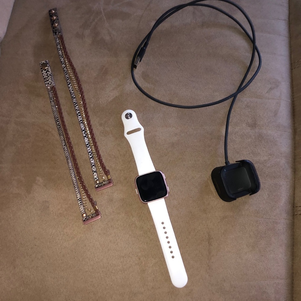 FitBit Versa 2. Charger and decorative band.